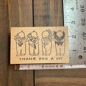 Vintage “Thank you a lot” rubber stamp.